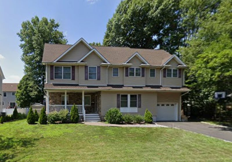 Two-story colonial with a stone front porch in Westfield, NJ